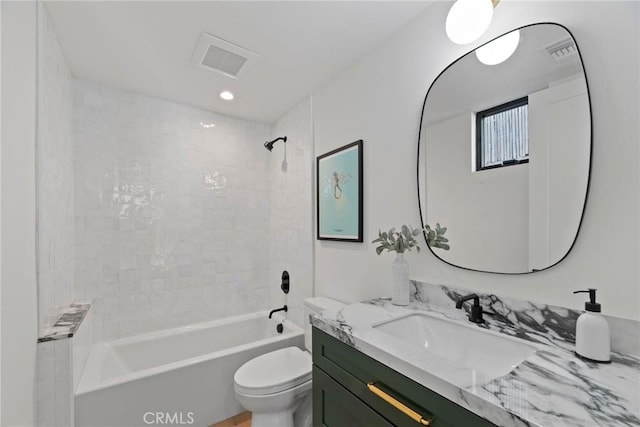 full bathroom with toilet, shower / washtub combination, vanity, and visible vents