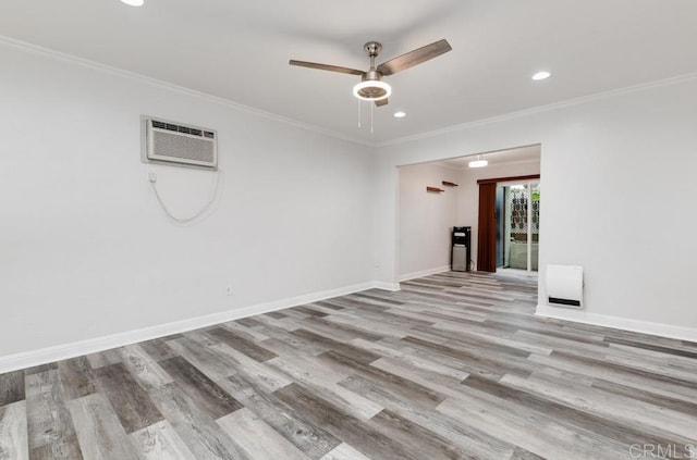 unfurnished room featuring ceiling fan, ornamental molding, wood finished floors, and recessed lighting