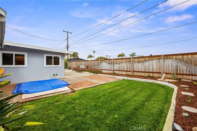 view of yard featuring a fenced backyard