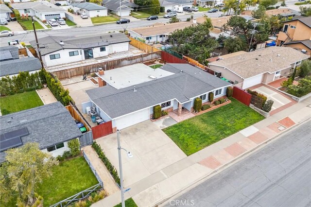 birds eye view of property with a residential view