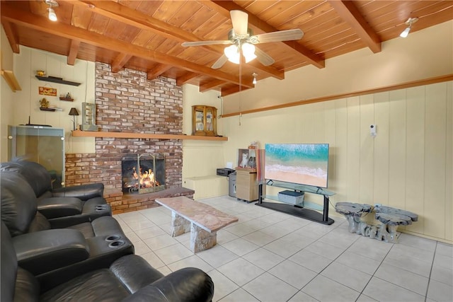 806 W 132nd St, Gardena, CA 90247 - living area featuring light tile patterned floors, a ceiling fan, wood ceiling, beamed ceiling, and a fireplace