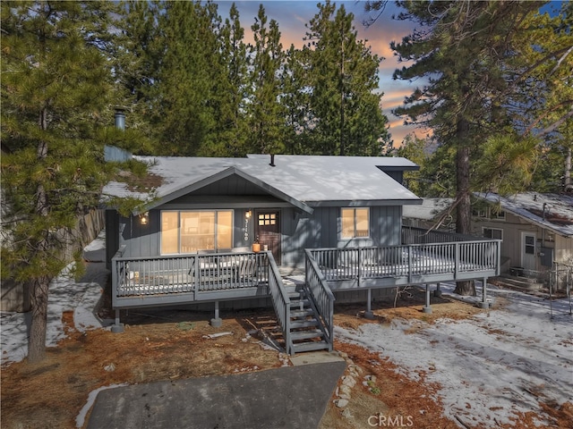 view of front of house with a deck