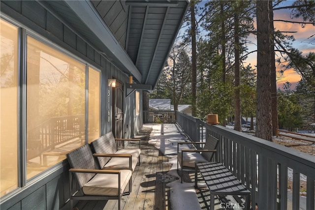 view of patio terrace at dusk