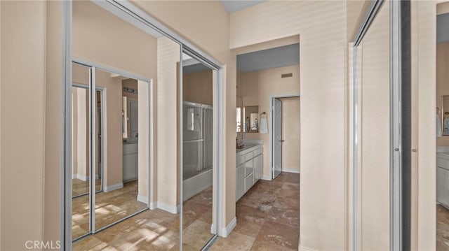 bathroom featuring baseboards