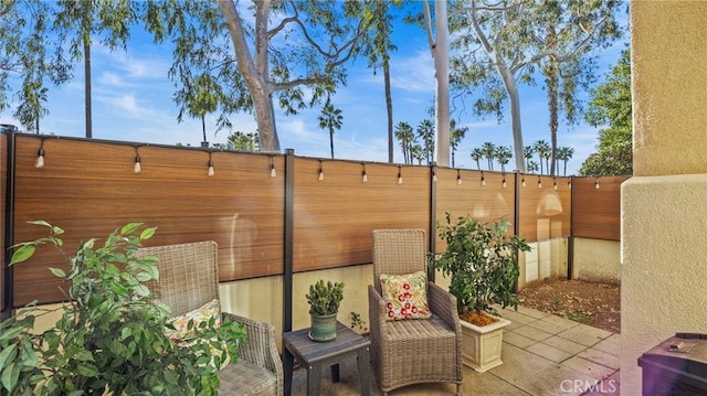 view of patio / terrace with fence