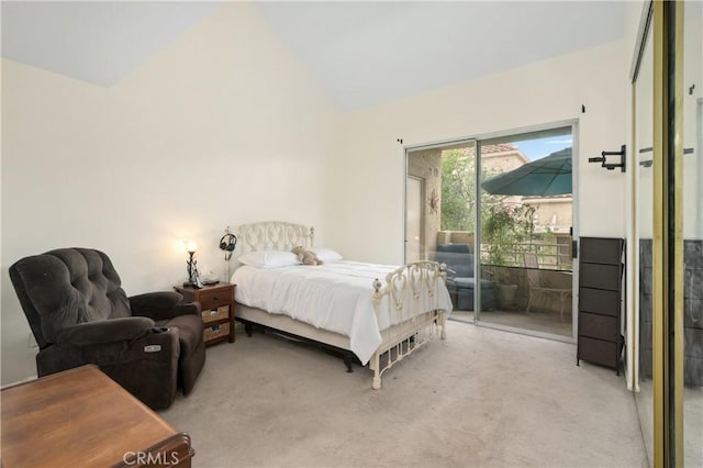 carpeted bedroom with access to exterior and lofted ceiling