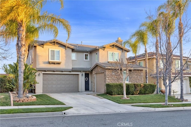 traditional-style home featuring a garage, solar panels, driveway, stucco siding, and a front lawn