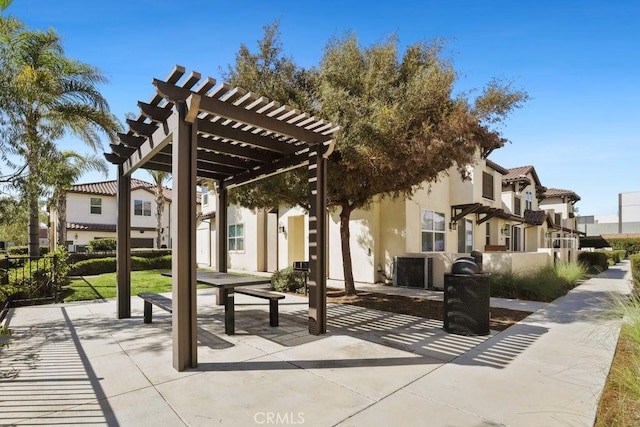 view of home's community with a residential view, a patio, and a pergola