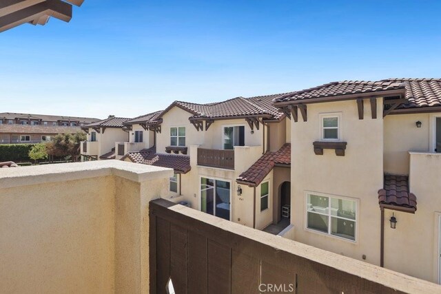 balcony featuring a residential view