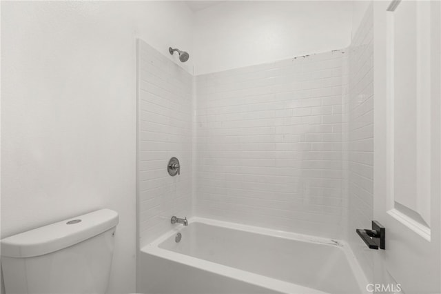 bathroom with toilet and shower / washtub combination