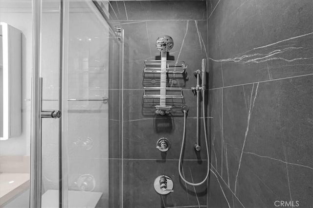 bathroom with a shower stall