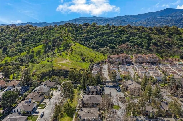 drone / aerial view featuring a mountain view and a residential view