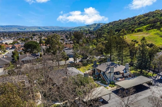birds eye view of property featuring a mountain view and a residential view