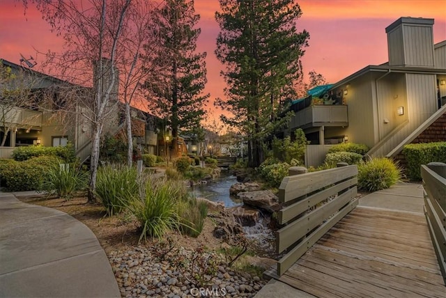 view of home's community with stairway
