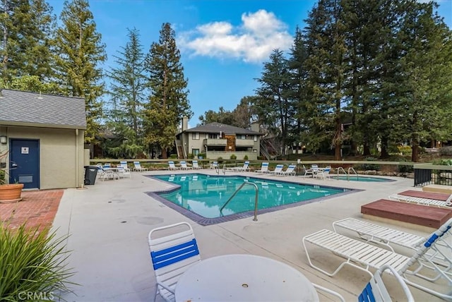 community pool featuring a patio