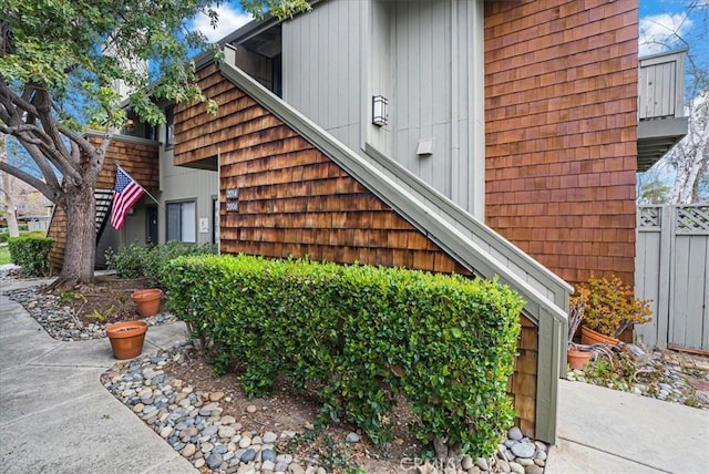 view of property exterior featuring fence