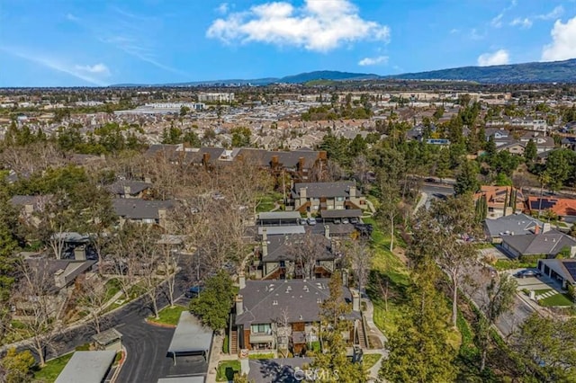 aerial view featuring a mountain view and a residential view
