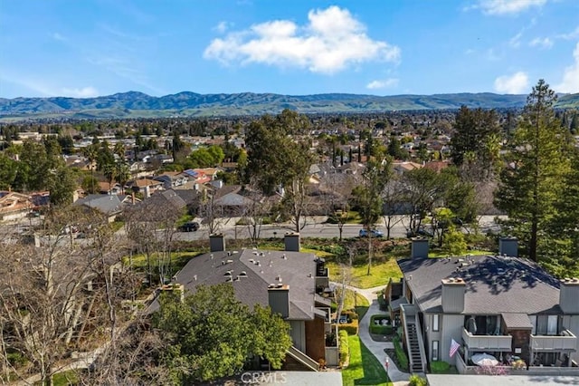 drone / aerial view with a residential view and a mountain view