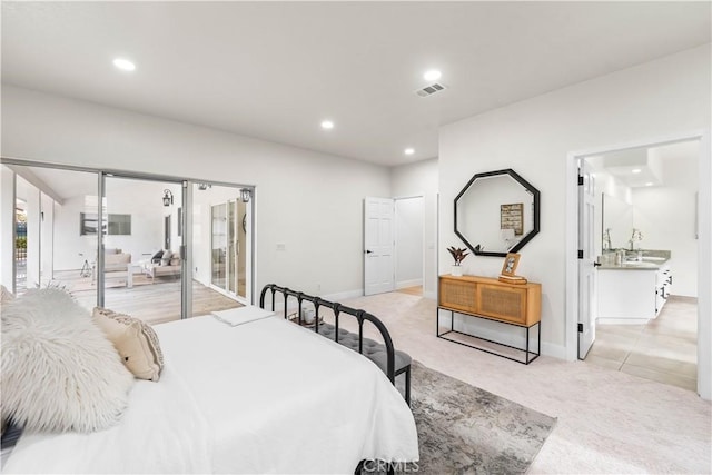 bedroom with light carpet, baseboards, visible vents, and recessed lighting