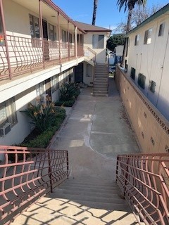 view of community featuring stairway