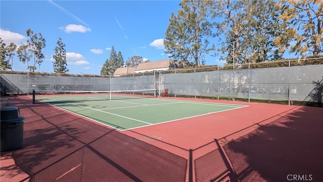 view of sport court featuring community basketball court and fence