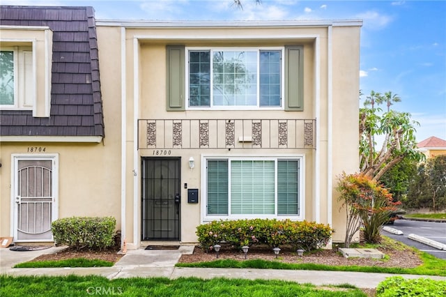 view of front of home featuring stucco siding