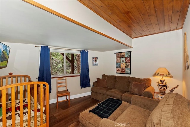 living room featuring wood ceiling, baseboards, and wood finished floors