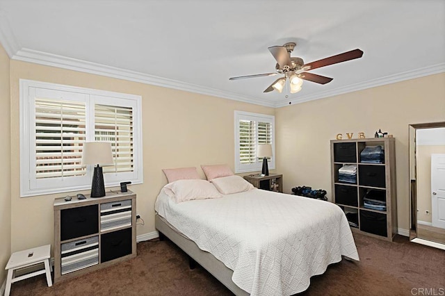 bedroom featuring baseboards, dark carpet, and crown molding