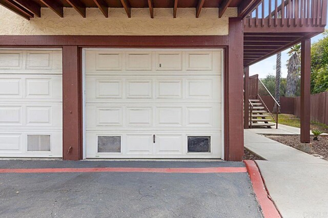 garage featuring driveway