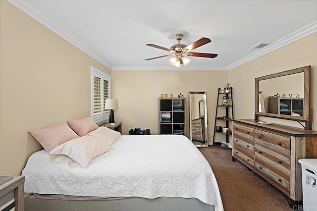 bedroom featuring ceiling fan, dark colored carpet, visible vents, and crown molding