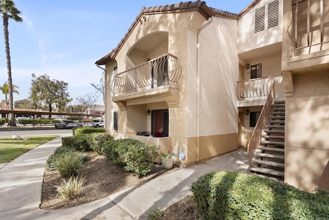 view of property with stairs