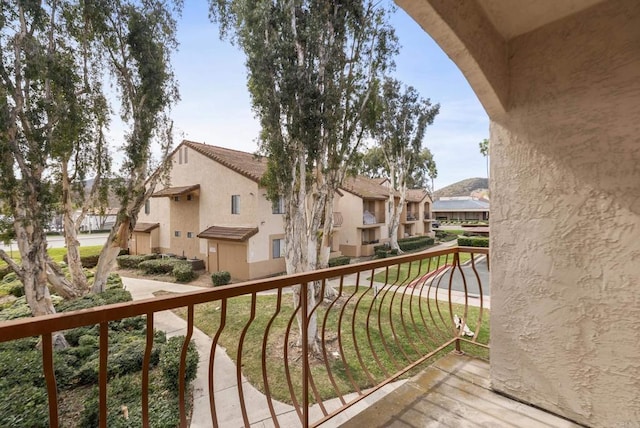 balcony featuring a residential view