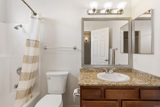 bathroom featuring toilet, shower / bath combination with curtain, and vanity