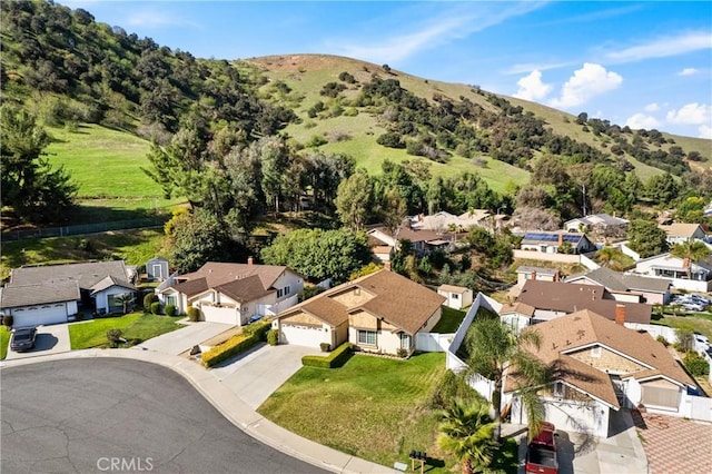 bird's eye view featuring a residential view and a mountain view