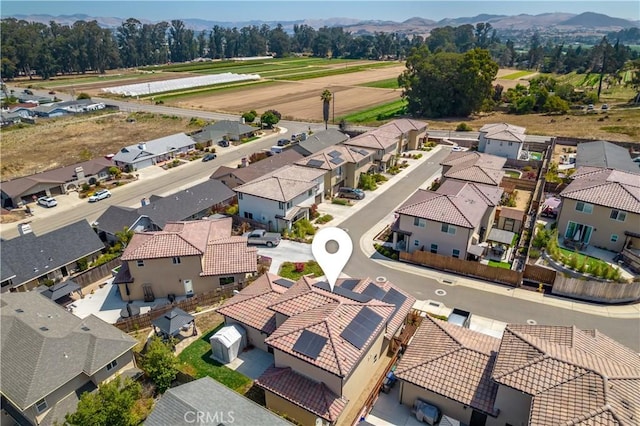 bird's eye view featuring a mountain view and a residential view