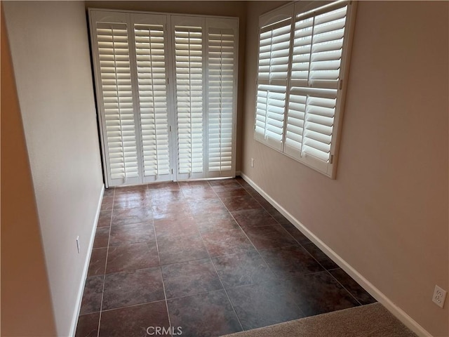 8853 Hollyhock Ct, Corona, CA 92883 - empty room with baseboards
