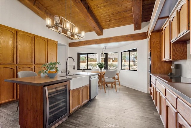 kitchen with a center island with sink, wood ceiling, wine cooler, a sink, and stainless steel dishwasher