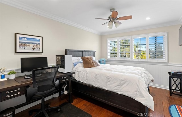 bedroom featuring ceiling fan, hardwood / wood-style flooring, and ornamental molding