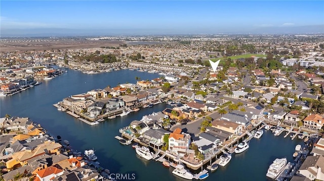 bird's eye view featuring a residential view and a water view