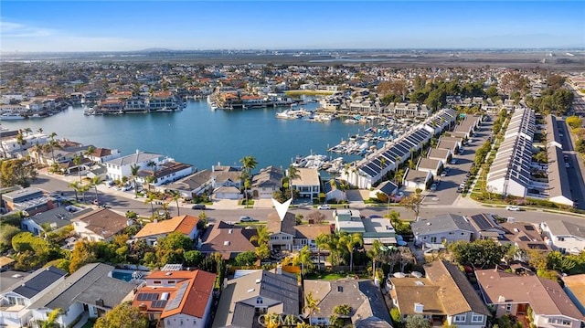 aerial view featuring a water view and a residential view