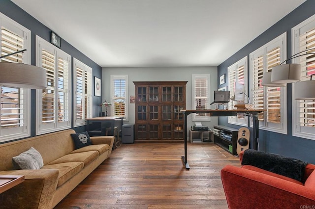 office space with wood-type flooring