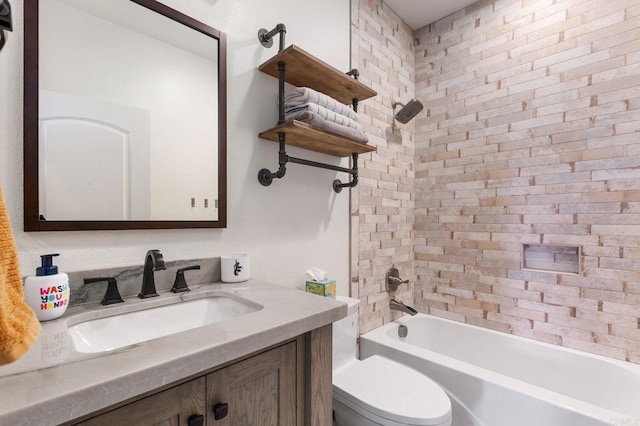 bathroom featuring vanity, toilet, and  shower combination