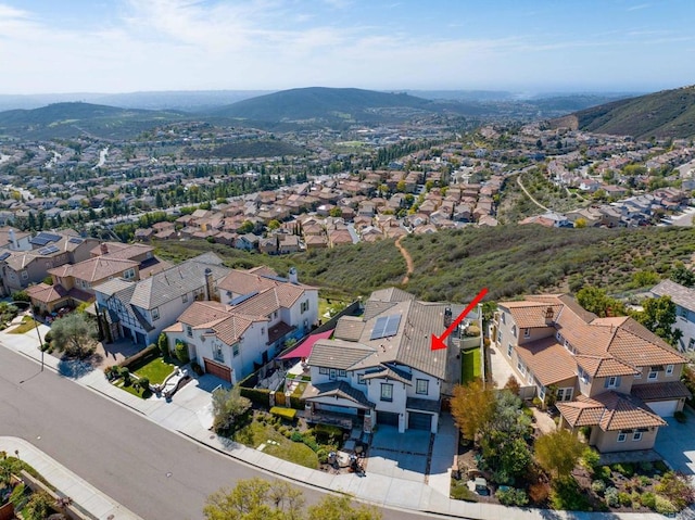 aerial view with a mountain view and a residential view