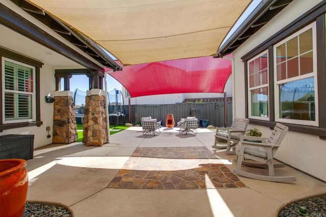 view of patio with fence