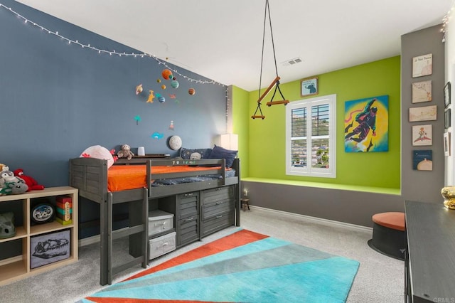 bedroom featuring visible vents, carpet, and baseboards