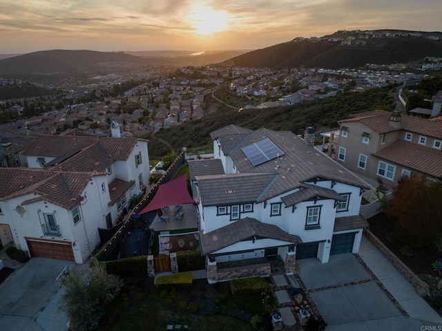 drone / aerial view with a mountain view and a residential view