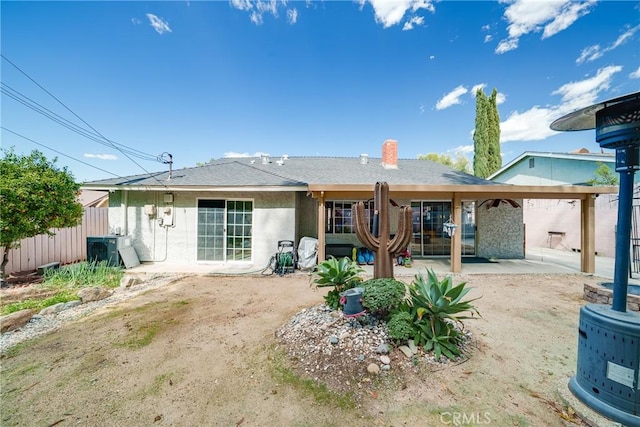 back of property featuring ac unit, a patio area, and fence