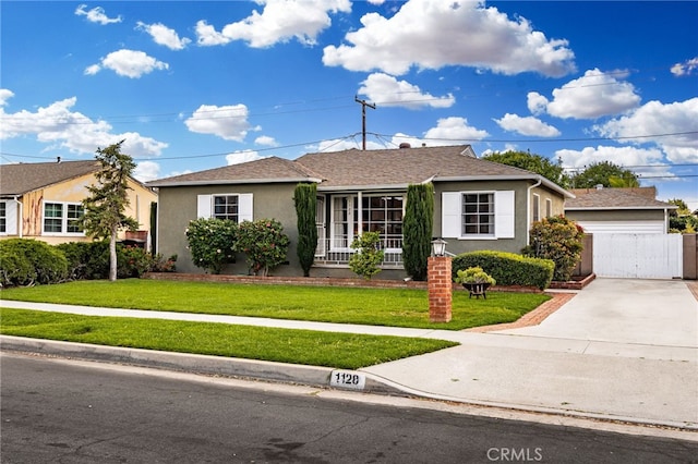 single story home with a garage, fence, roof with shingles, stucco siding, and a front lawn