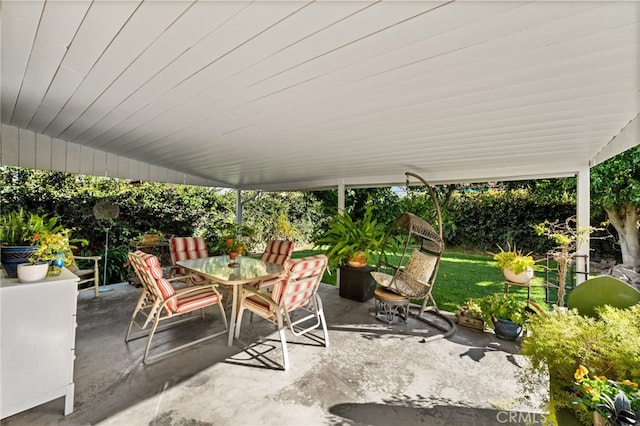 view of patio with outdoor dining area