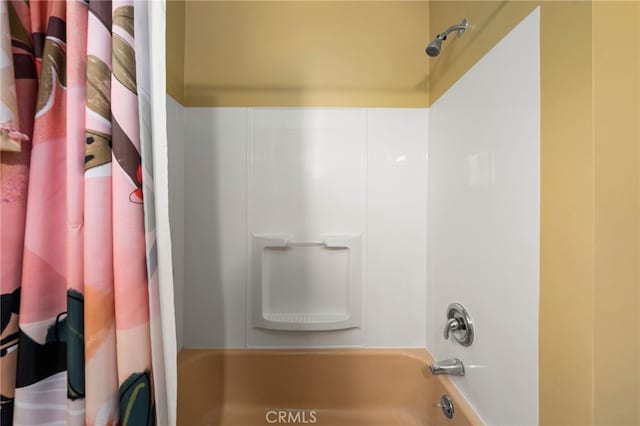 bathroom with shower / tub combo